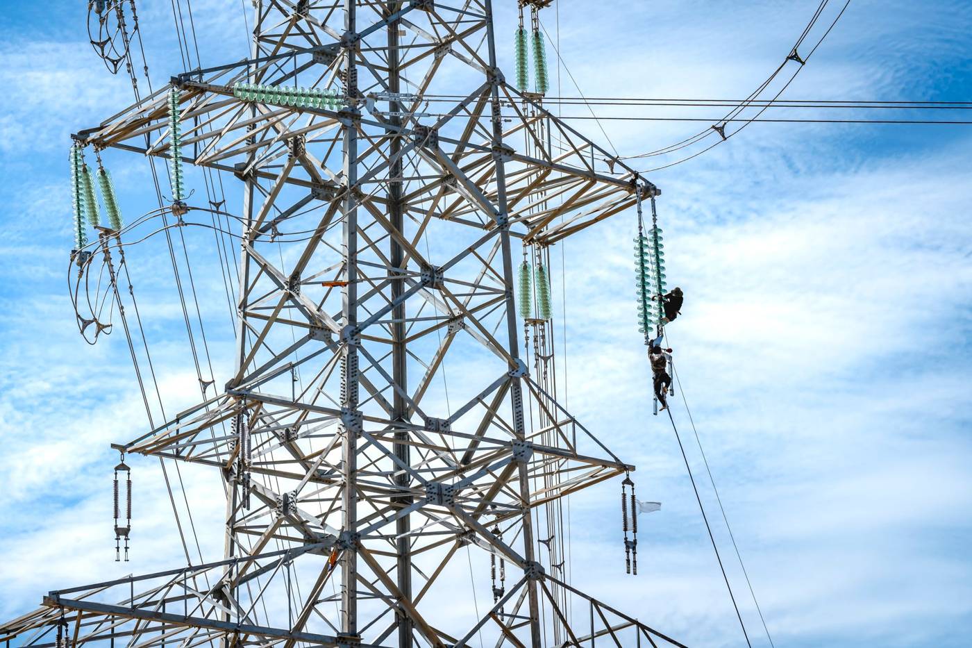 Power line workers construction
