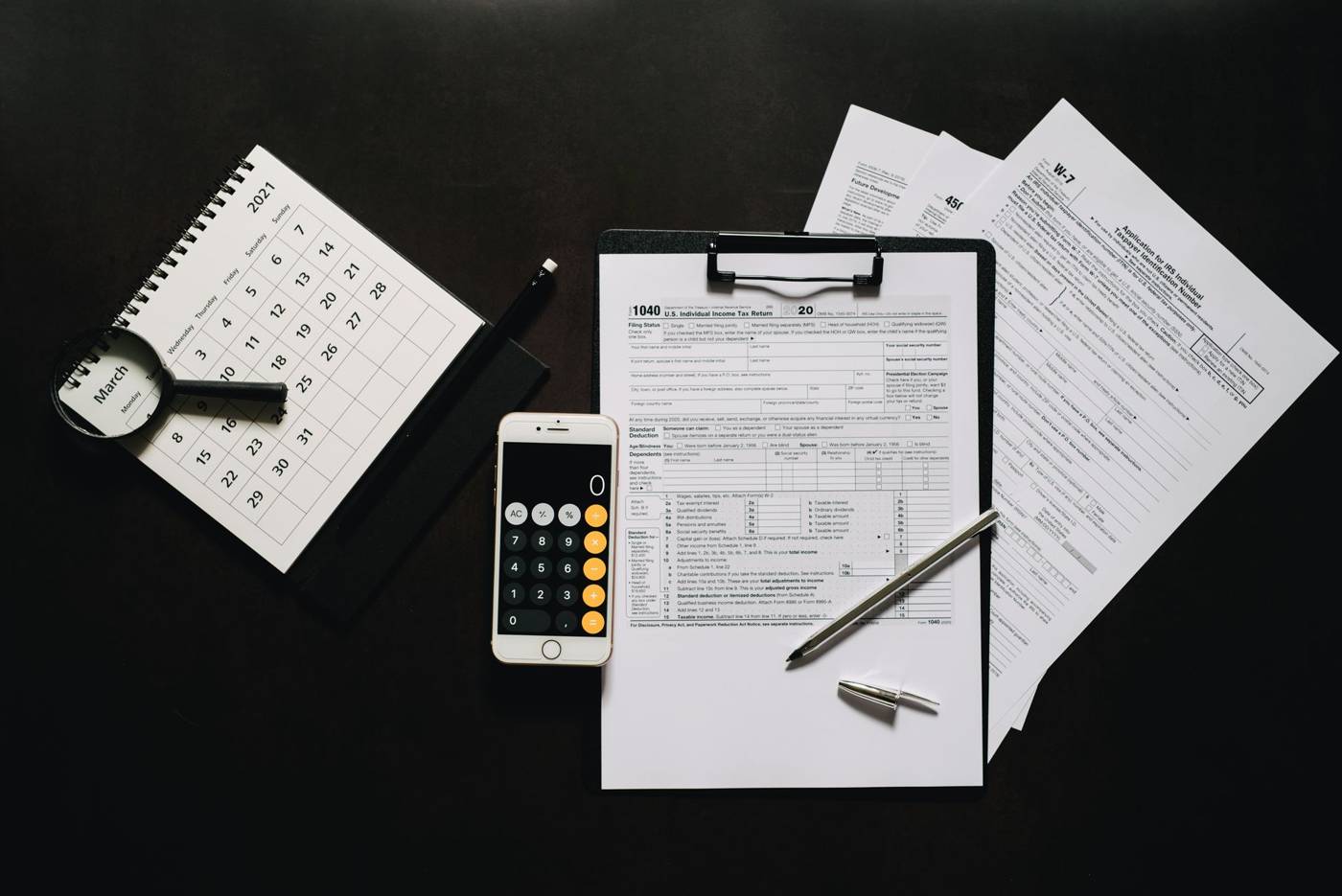 Tax forms calculator desk