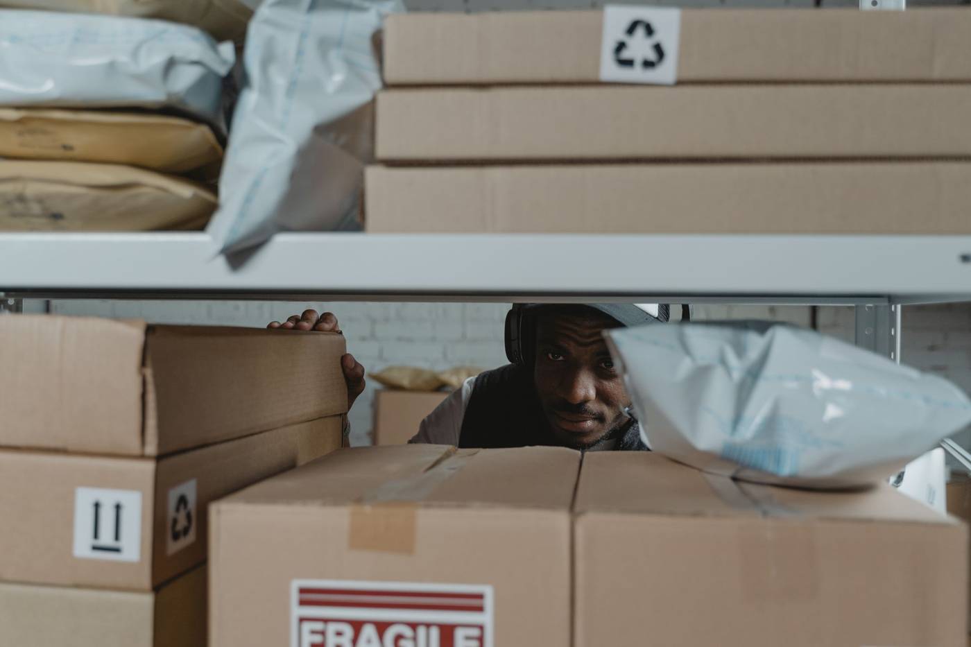 Warehouse delivery worker packing